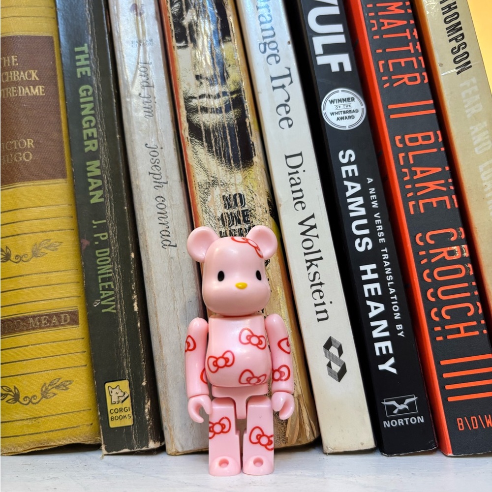 Pink Bearbrick Figure with Red Accents